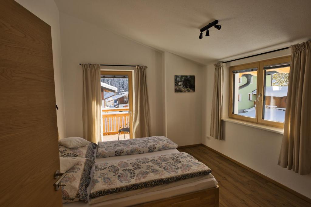 Postel nebo postele na pokoji v ubytování Haus Timmler