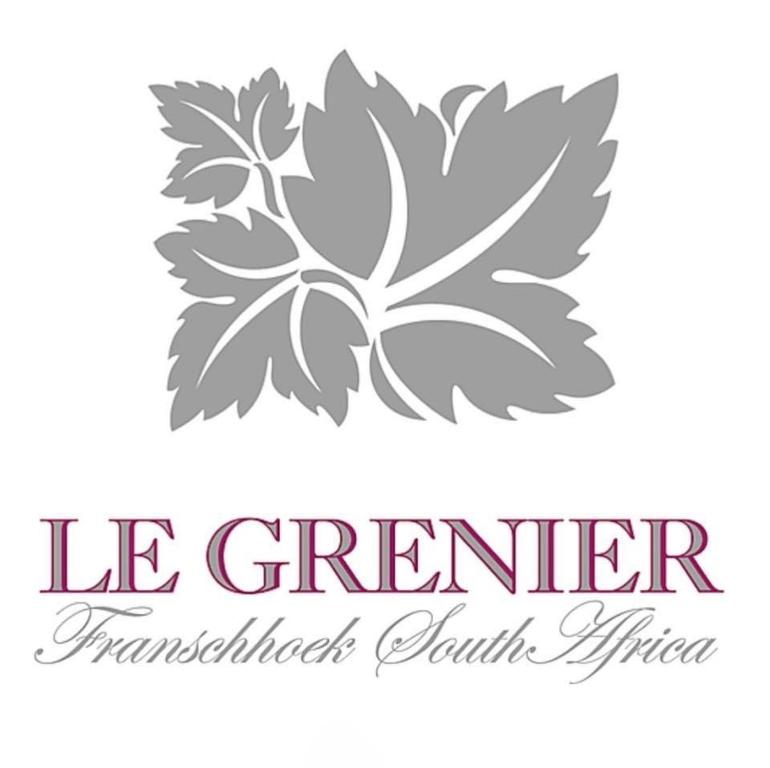 a logo for a restaurant with a leafy logo at Le Grenier Luxury Loft in Franschhoek