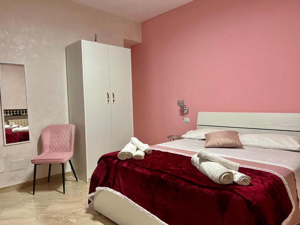 Postel nebo postele na pokoji v ubytování AL CENTRO