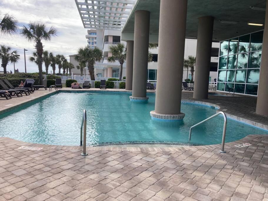a swimming pool in the middle of a building at Oceanfront Get Away in Myrtle Beach