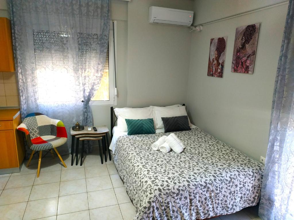 Posteľ alebo postele v izbe v ubytovaní Μοντέρνο Studio στο Κέντρο της Λάρισας