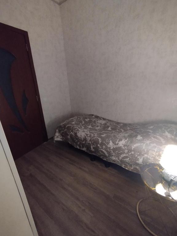 Postel nebo postele na pokoji v ubytování Guest House Mtisubani