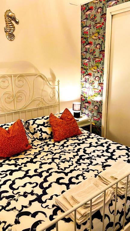 A bed or beds in a room at Il Salernitano Bed and Breakfast
