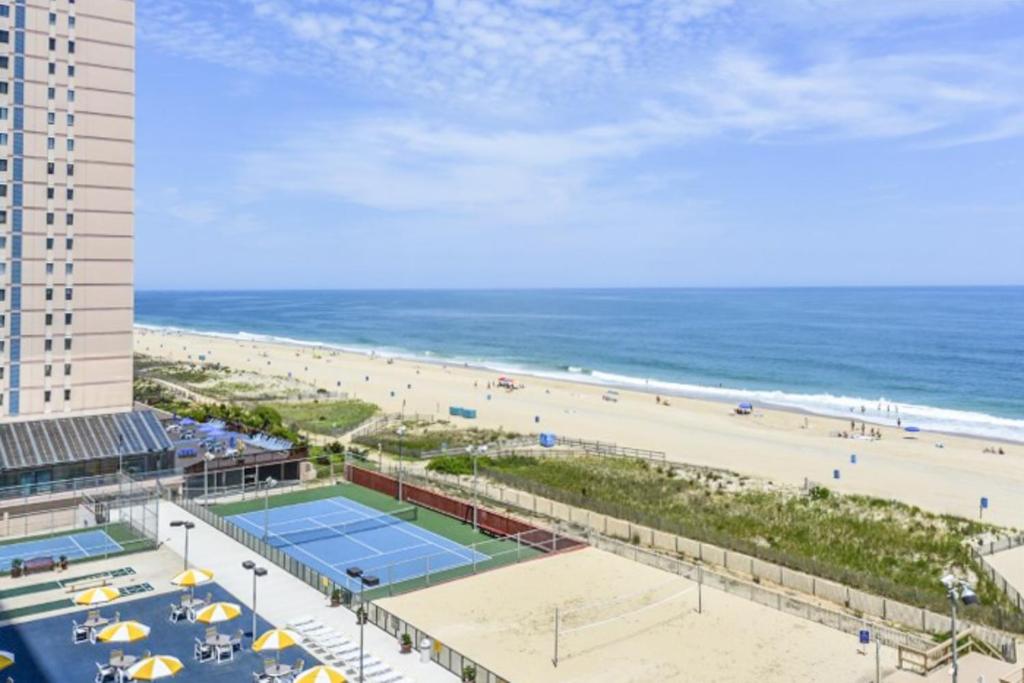 a view of the beach from the balcony of a resort at Golden Sands 613 in Ocean City