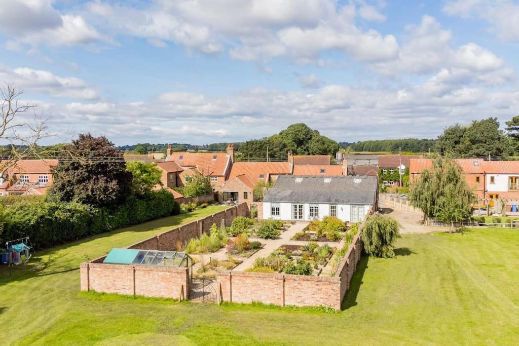 an aerial view of a house with a garden at The Garden House in Low Catton 
