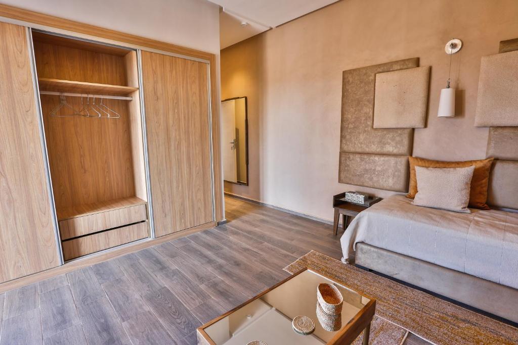 Postel nebo postele na pokoji v ubytování Villa ARGANINA piscine chauffée