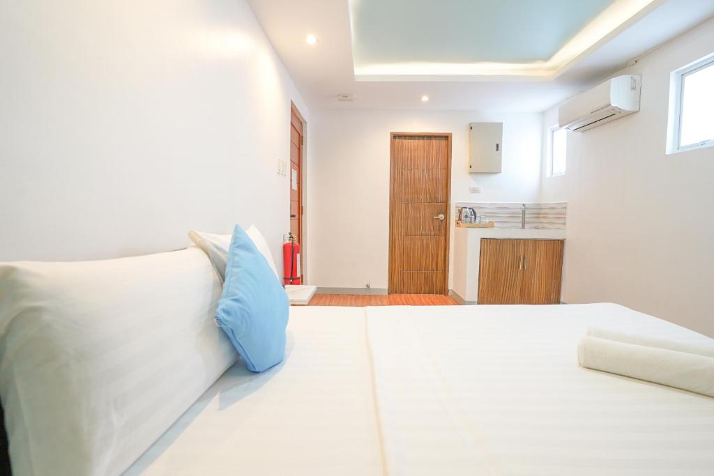 Postel nebo postele na pokoji v ubytování Arzo Hotel Premier