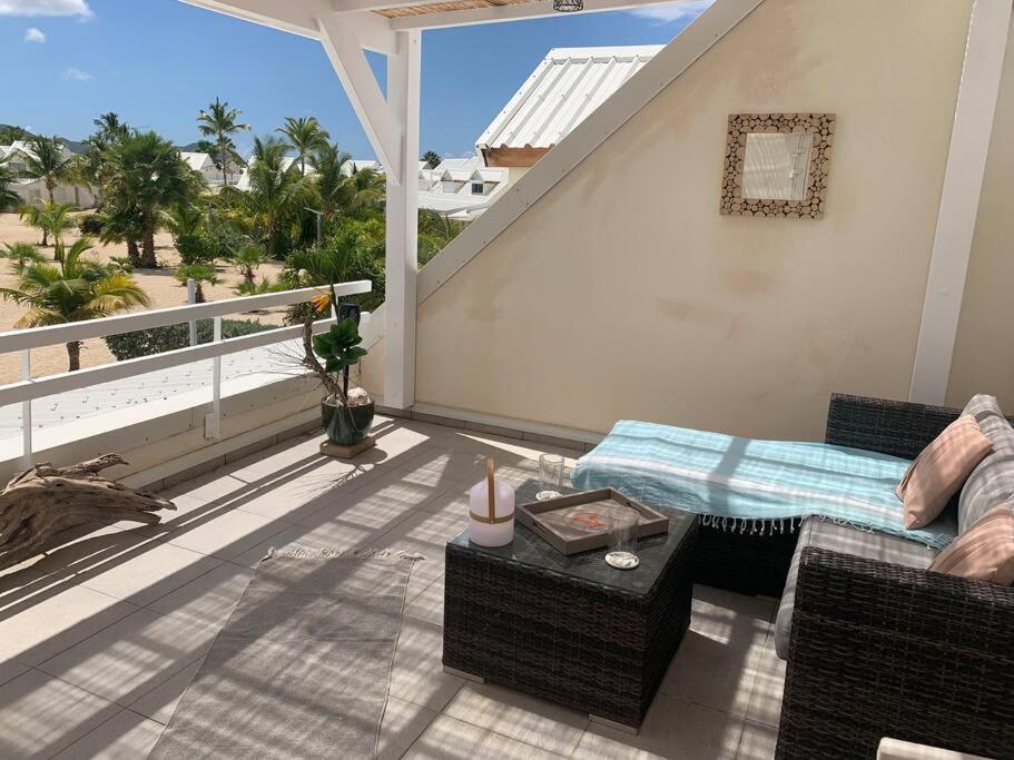 Balkón nebo terasa v ubytování Duplex luxe au NBBC , les pieds dans le sable