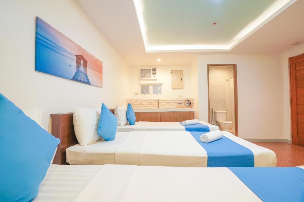 Postel nebo postele na pokoji v ubytování Arzo Hotel Premier