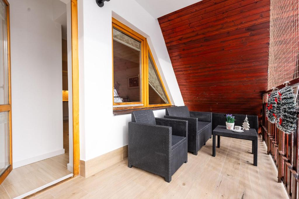 Posedenie v ubytovaní Apartamenty Orkana Centrum Zakopane
