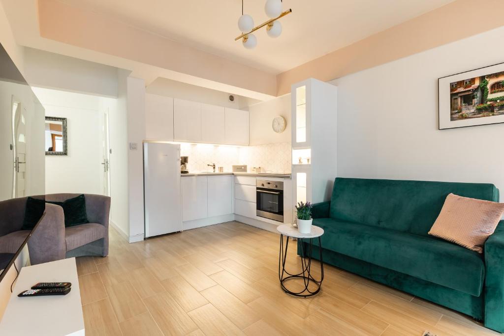 Kuchyňa alebo kuchynka v ubytovaní Apartamenty Orkana Centrum Zakopane