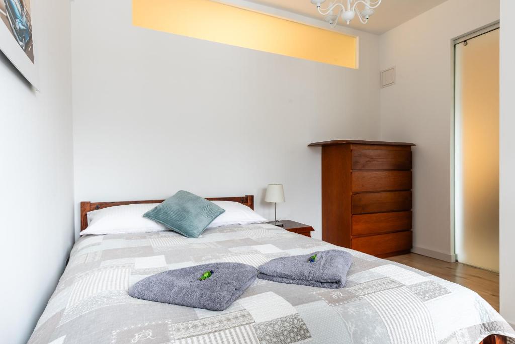 Posteľ alebo postele v izbe v ubytovaní Apartamenty Orkana Centrum Zakopane