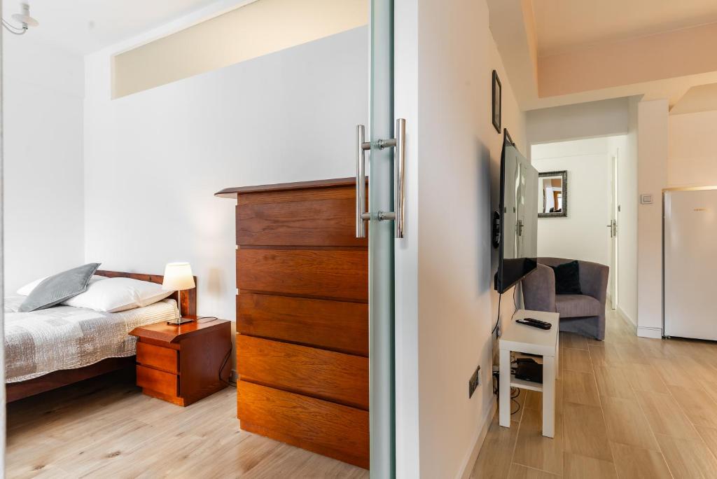 Posteľ alebo postele v izbe v ubytovaní Apartamenty Orkana Centrum Zakopane