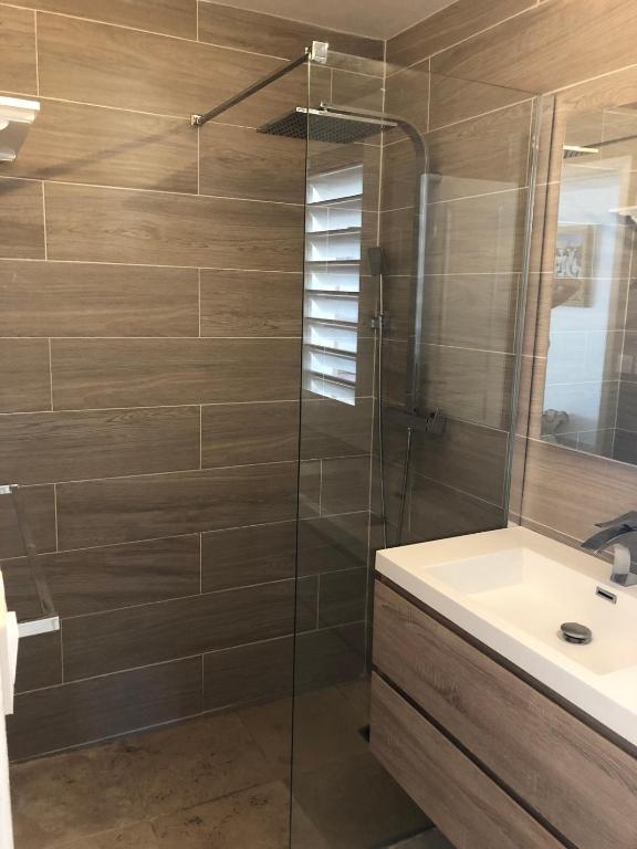 Koupelna v ubytování Duplex luxe au NBBC , les pieds dans le sable