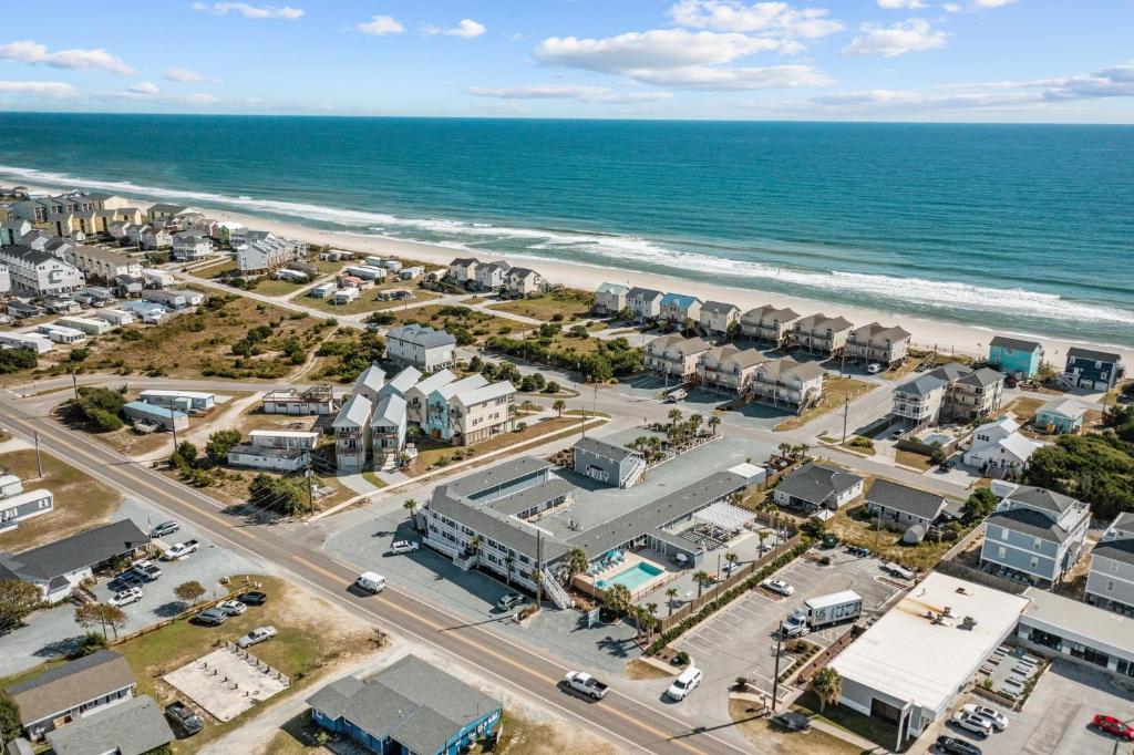 an aerial view of a city and the beach at Loggerhead Inn and Suites in Surf City