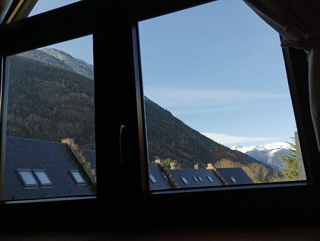 Nespecifikovaný výhled na hory nebo výhled na hory při pohledu z apartmánu