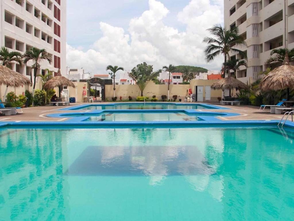 Piscina en o cerca de Casa en Quintas del Mar con acceso a la playa