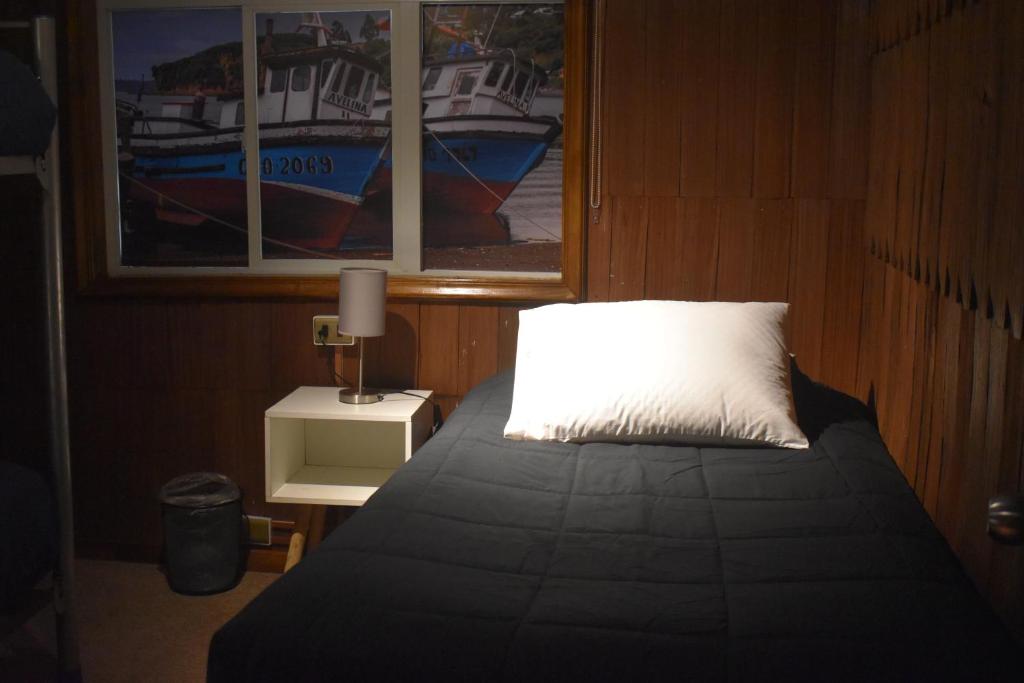 Cama o camas de una habitación en Estación Hostel