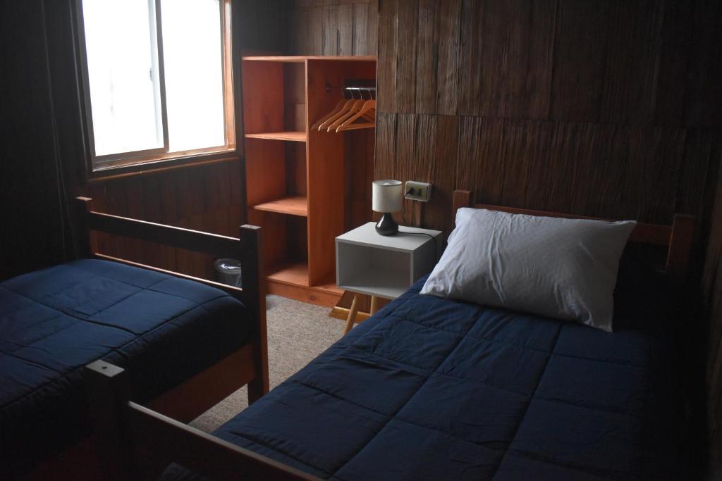 Cama o camas de una habitación en Estación Hostel