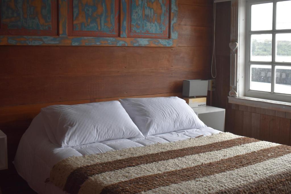 Postel nebo postele na pokoji v ubytování Estación Hostel