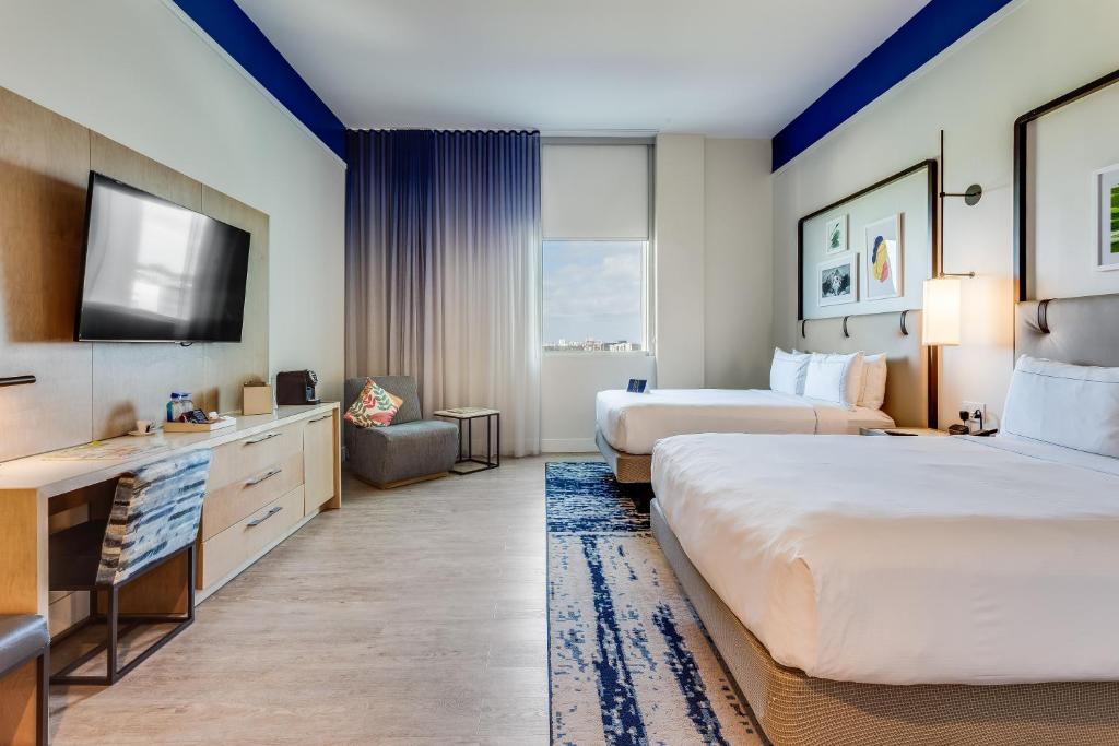 Postel nebo postele na pokoji v ubytování SERENA Hotel Aventura Miami, Tapestry Collection by Hilton