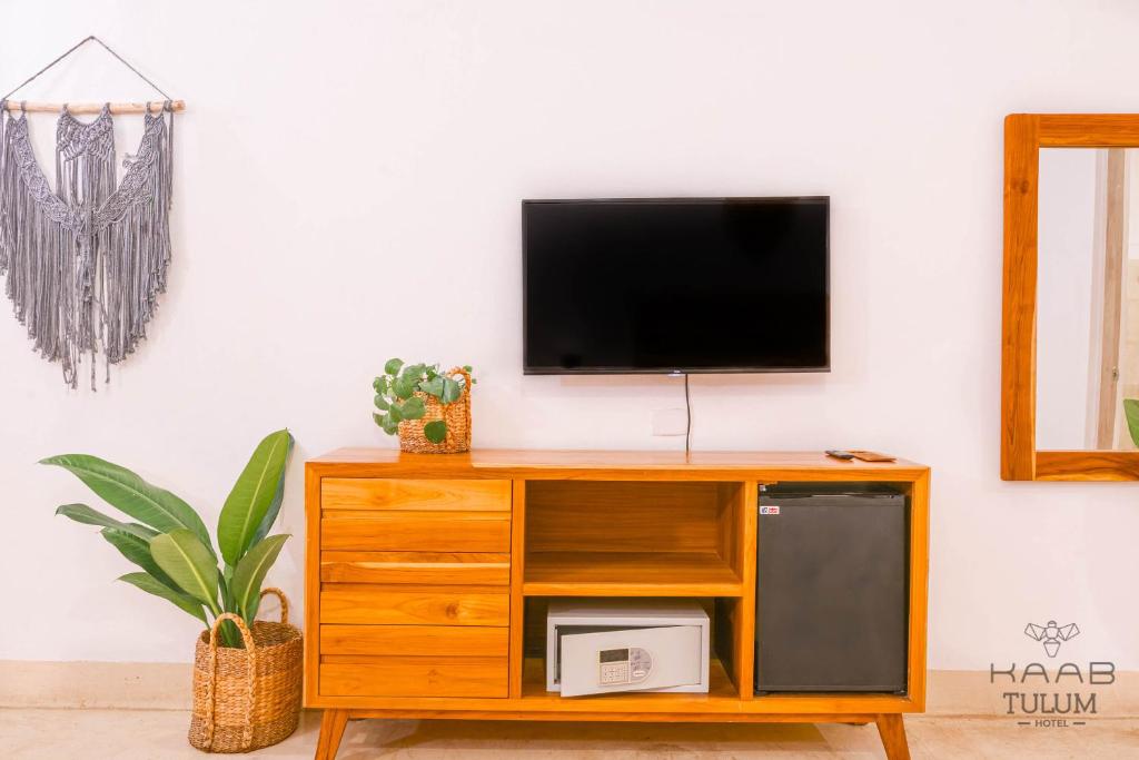 TV a/nebo společenská místnost v ubytování Kaab Tulum