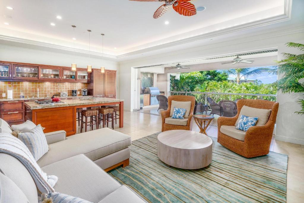 a living room with a couch and a table at Ho'olei Unit 12-2, Close to Pool, Walk to Beach in Wailea