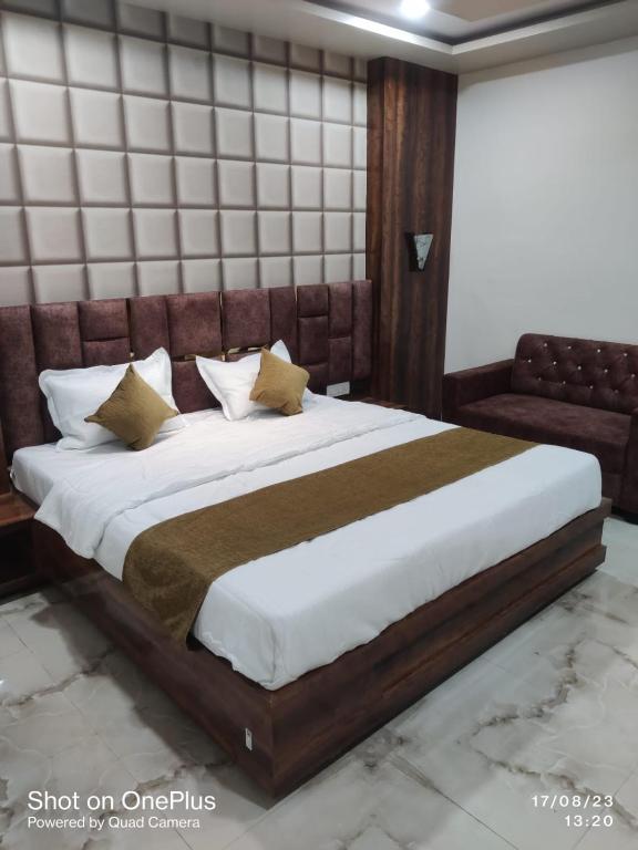 Postel nebo postele na pokoji v ubytování Hotel Praj Paradise