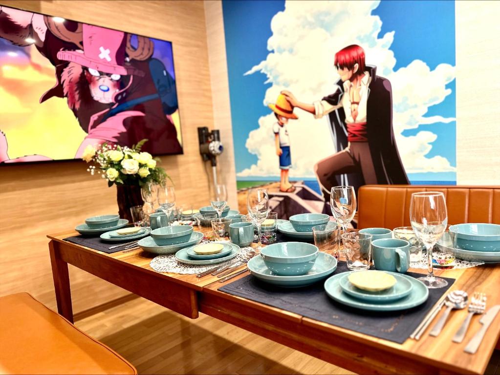 a table with plates and glasses on top of it at 板橋駅前店・ダイヤモンド・悠 in Tokyo