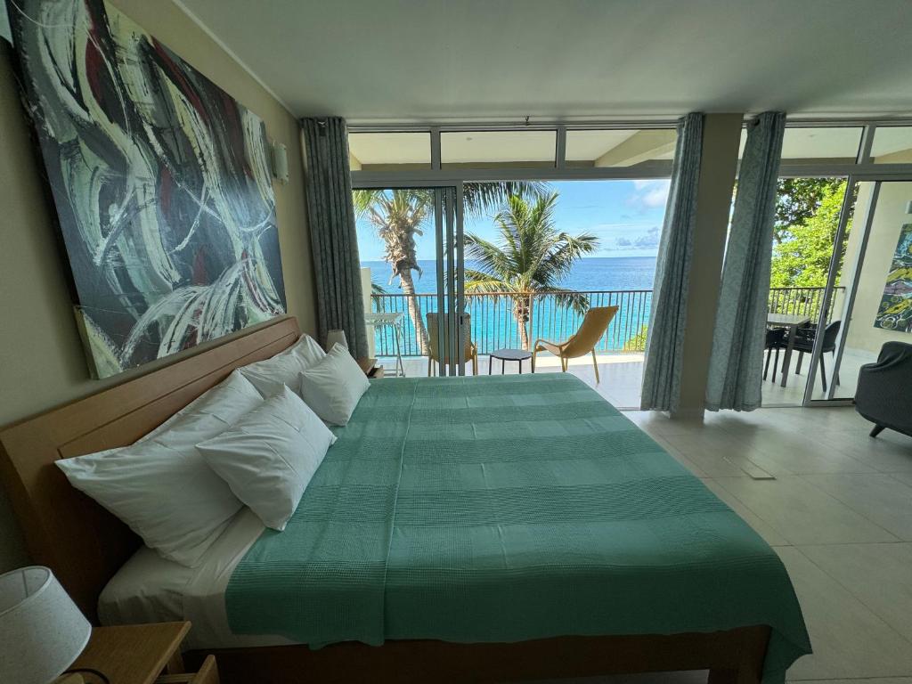 Postel nebo postele na pokoji v ubytování Maka Bay Self Catering