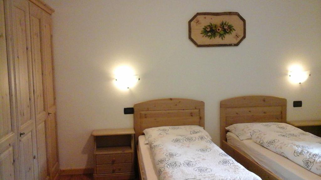Posteľ alebo postele v izbe v ubytovaní Cèsa Raggio di Sole