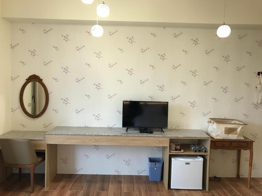 TV a/nebo společenská místnost v ubytování 花蓮太平洋會館民宿
