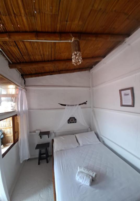 Postel nebo postele na pokoji v ubytování Hotel Gabarra Lodge