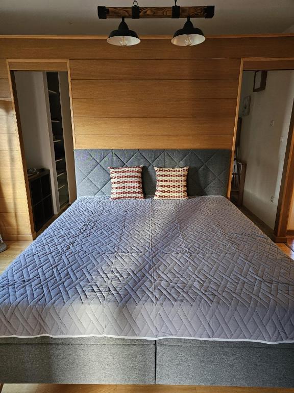 Voodi või voodid majutusasutuse Apartment Ad Alta Millstatt toas