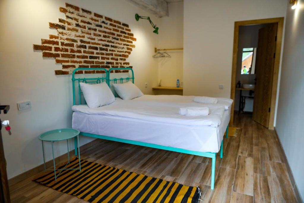 Postel nebo postele na pokoji v ubytování Hotel Arevi Gosh