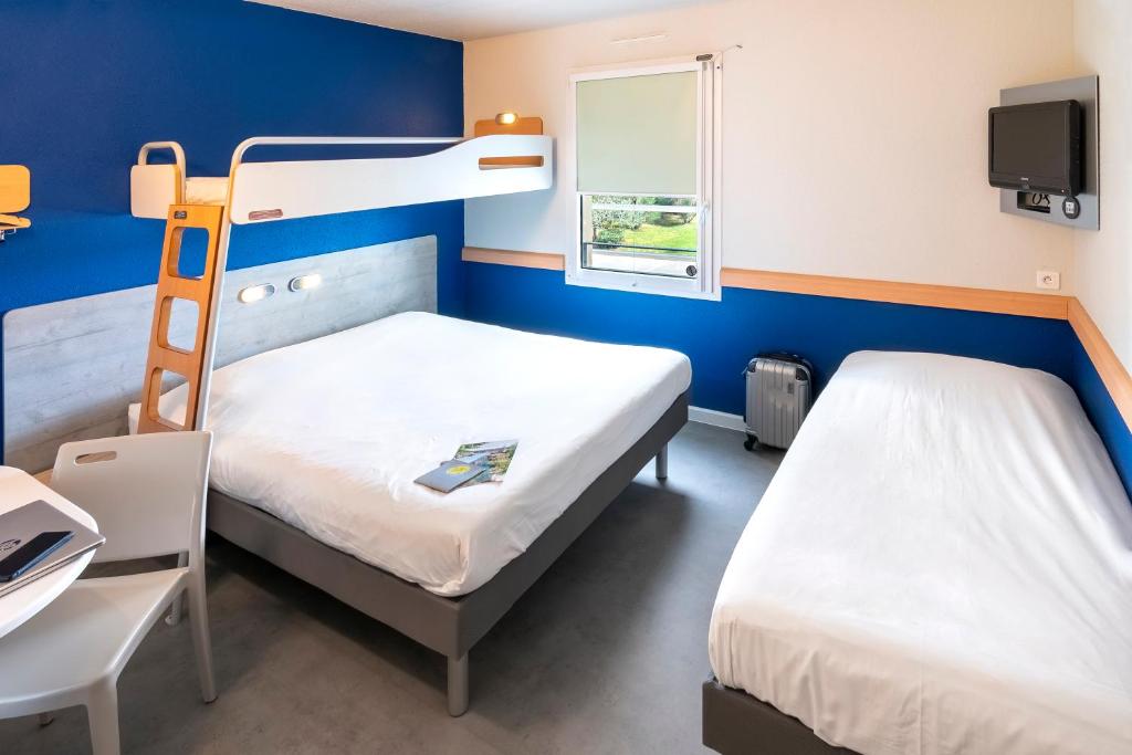 Postel nebo postele na pokoji v ubytování ibis budget Saint-Maximin