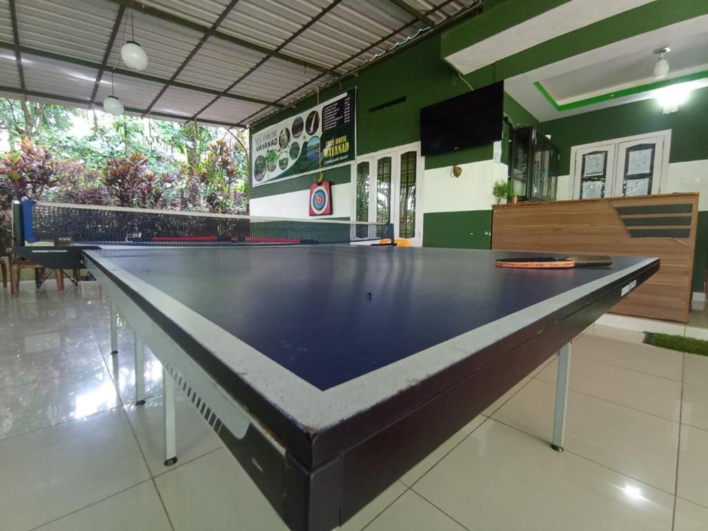 Stolní tenis v ubytování Tree House Wayanad nebo okolí