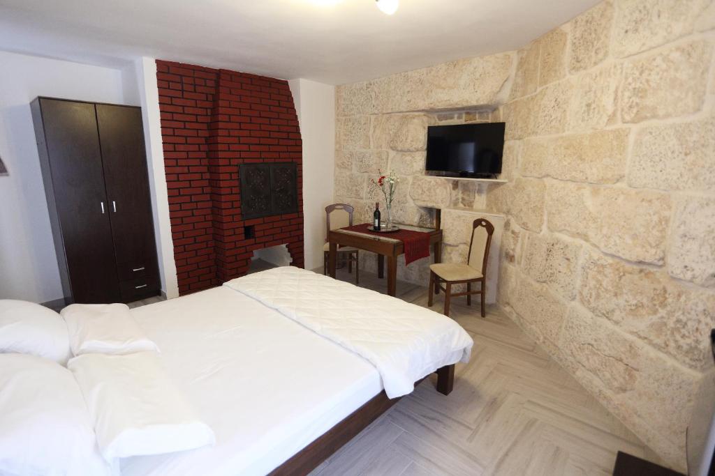 Postel nebo postele na pokoji v ubytování Golden Gate Dream Rooms