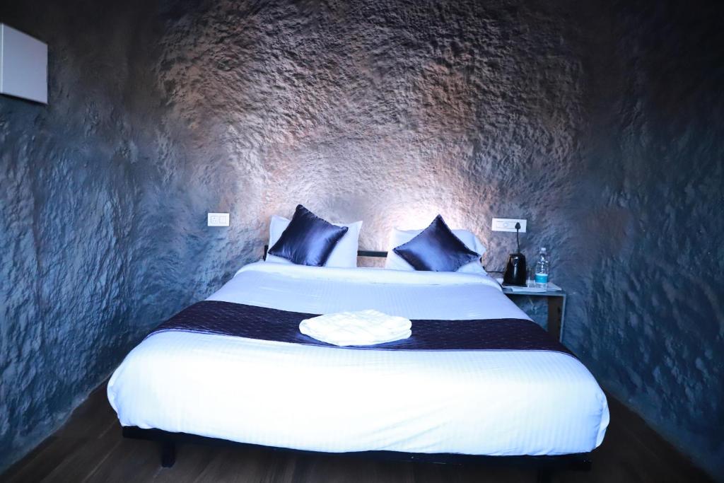 Postel nebo postele na pokoji v ubytování Konfudha Resort