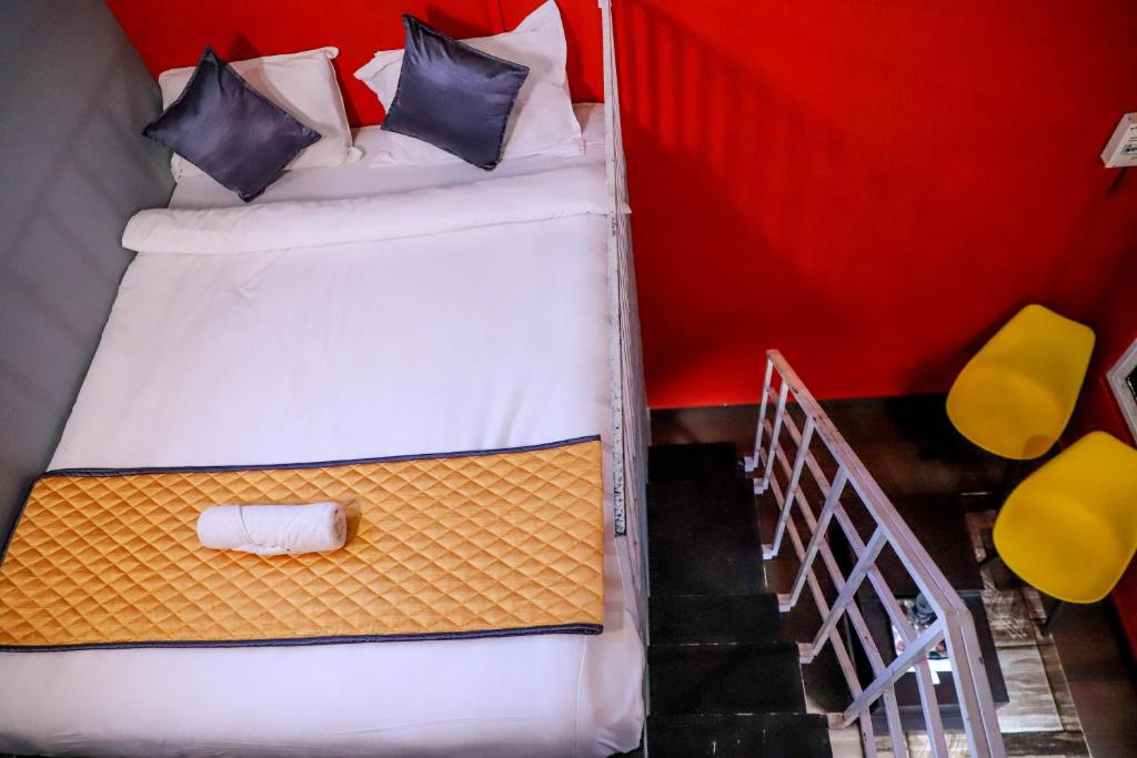 Postel nebo postele na pokoji v ubytování Konfudha Resort