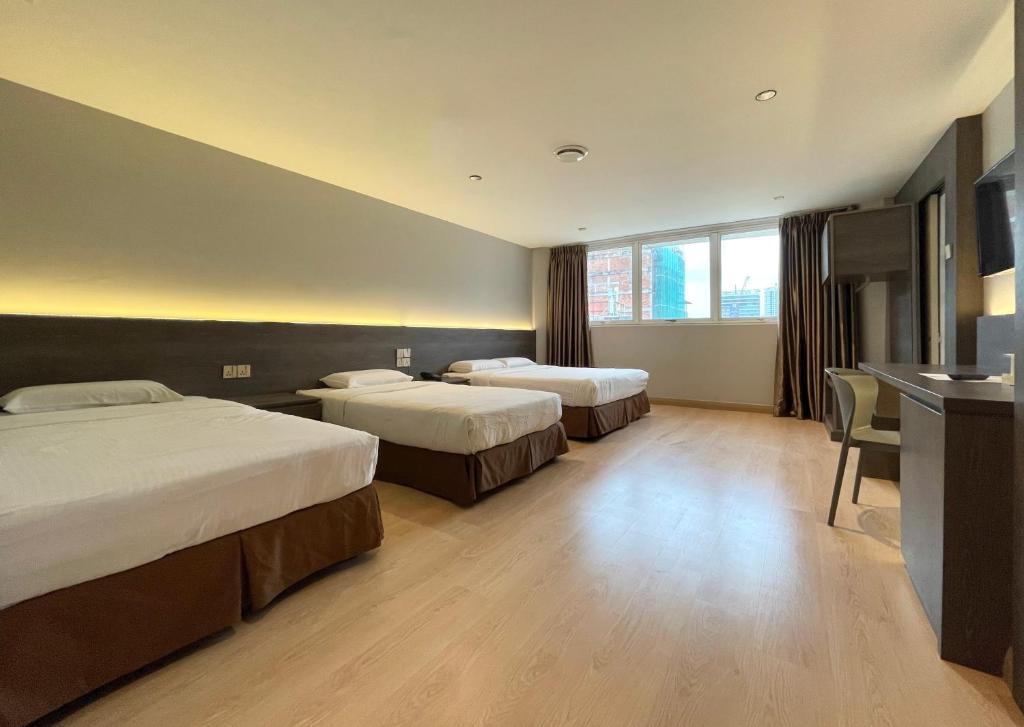 Postel nebo postele na pokoji v ubytování Hotel Imperial