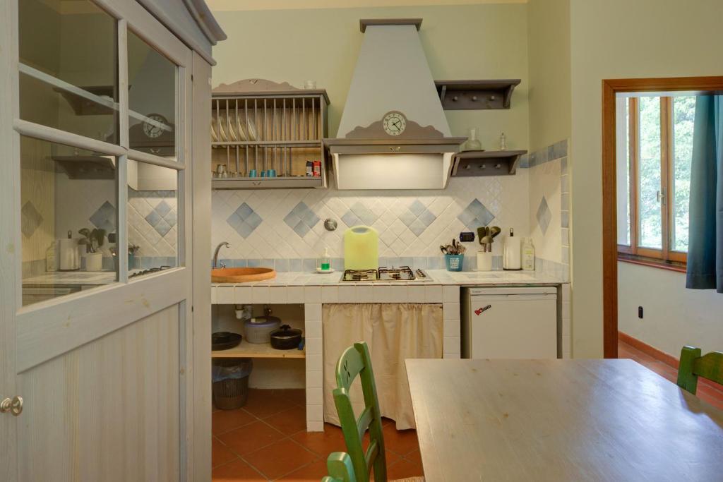 Kuchyň nebo kuchyňský kout v ubytování Albergo Villa San Michele