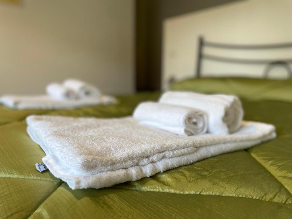 Postel nebo postele na pokoji v ubytování Appartamento in Piazza Spolethome