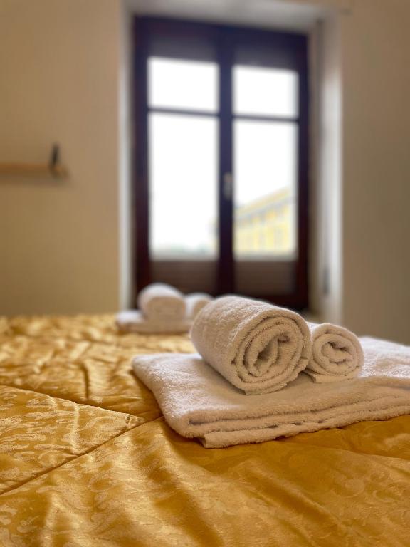 Postel nebo postele na pokoji v ubytování Appartamento in Piazza Spolethome