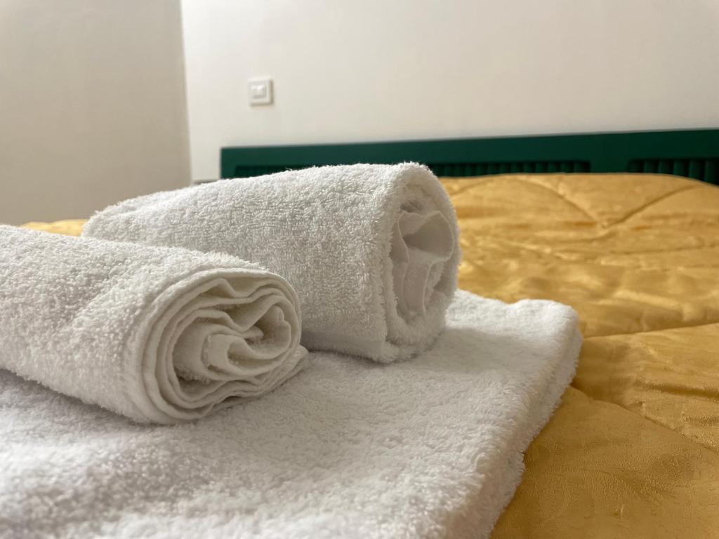 Postel nebo postele na pokoji v ubytování Appartamento in Piazza Spolethome