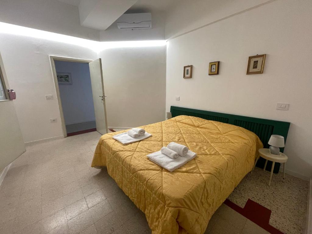 Postel nebo postele na pokoji v ubytování Appartamento in Piazza Spolethome