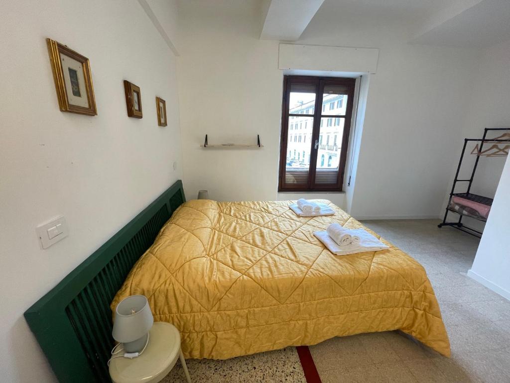 Postel nebo postele na pokoji v ubytování Appartamento in Piazza Spolethome