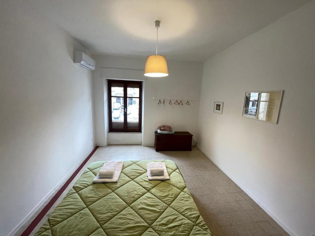 Postel nebo postele na pokoji v ubytování Appartamento in Piazza Spolethome