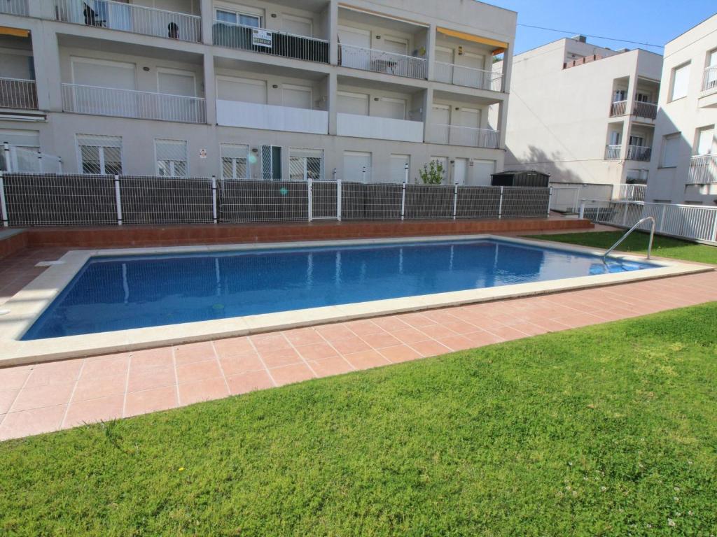 Bazén v ubytování Apartamento moderno, cerca de playa Les Tonyines, piscina comunitaria, terraza y WiFi - ES-228-141 nebo v jeho okolí