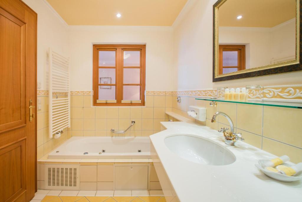 Koupelna v ubytování Hotel AlpenSchlössl